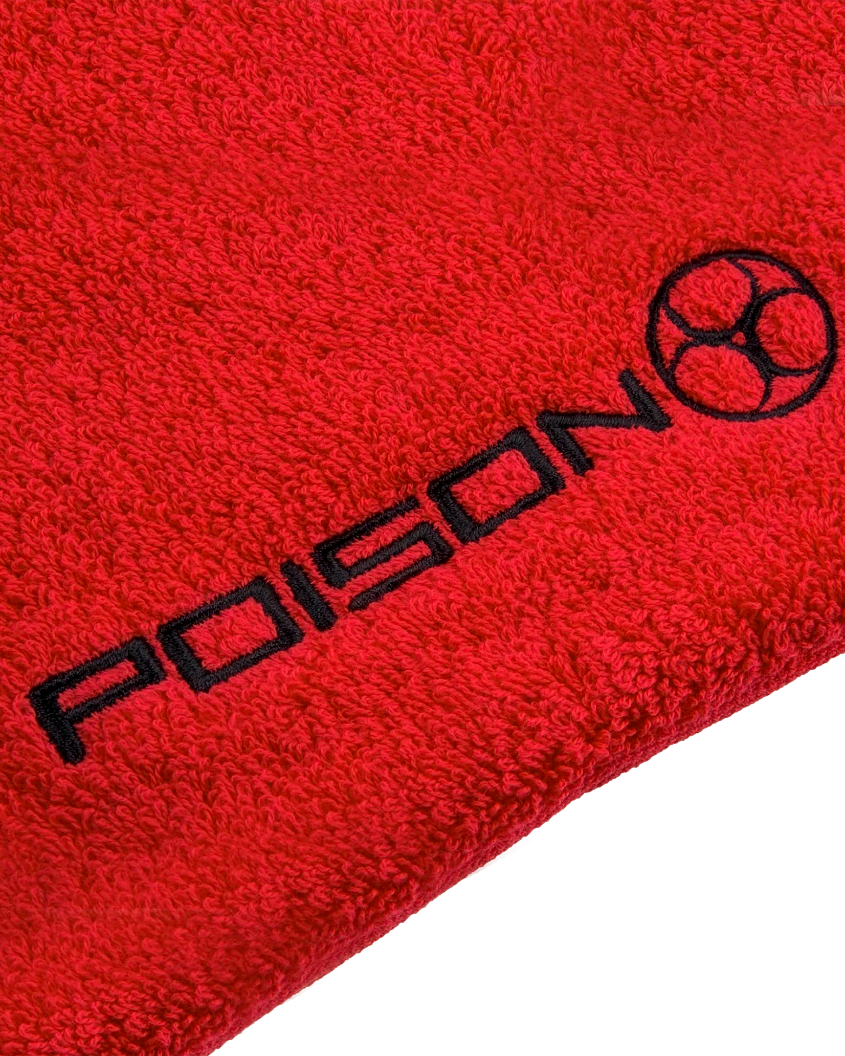 Red towel with black 'POISON' logo on a white background.