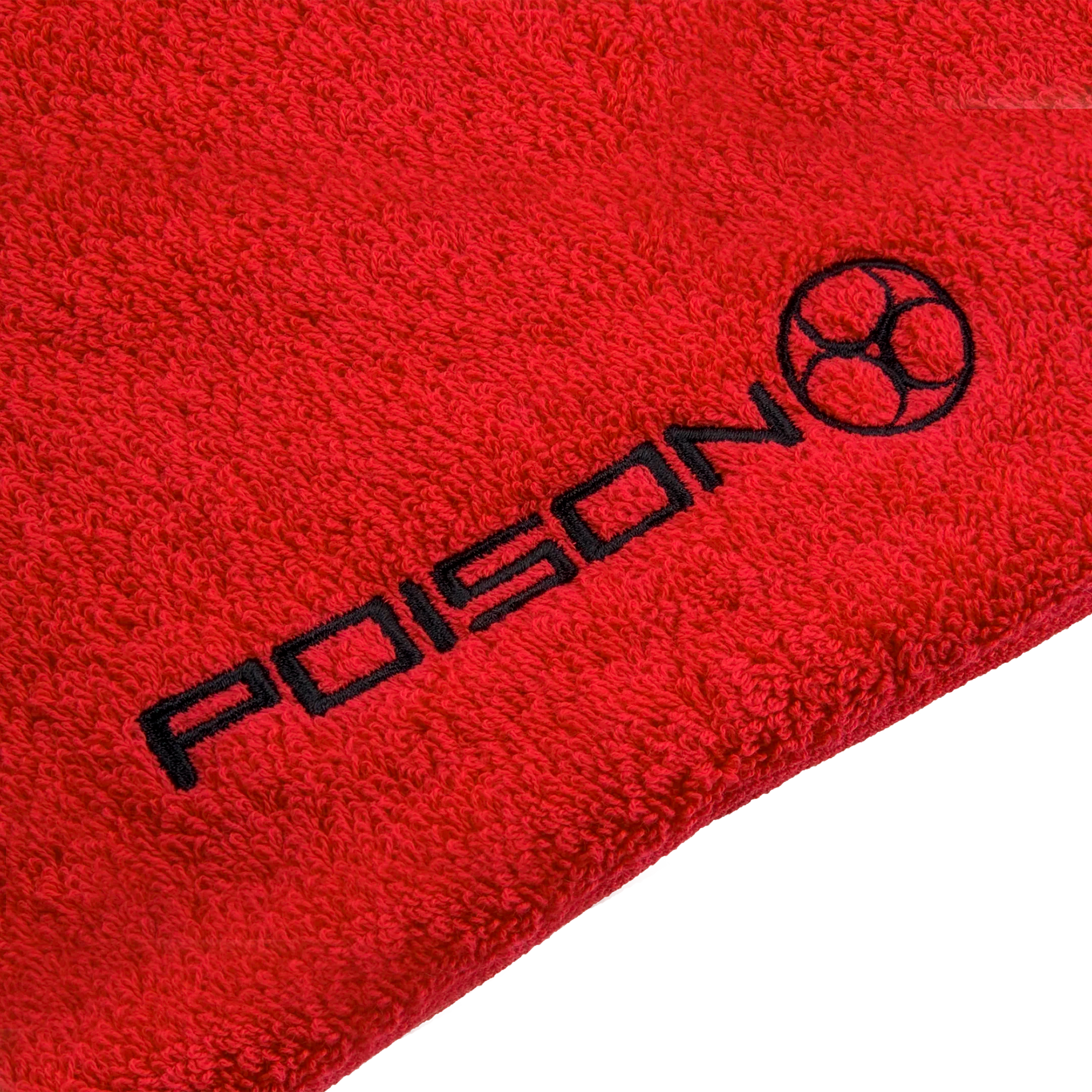 Close up of red towel with black 'POISON'