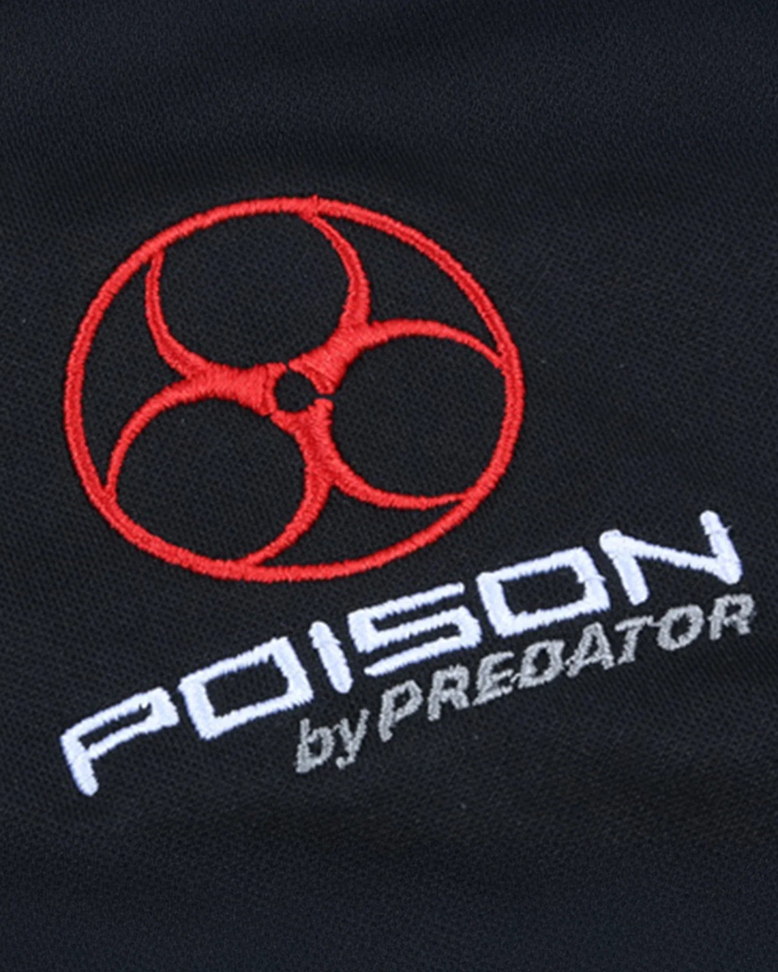 Red and white Poison by Predator logo against a black fabric background.