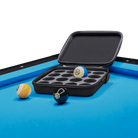 Black pool ball case with pool balls on a blue pool table.