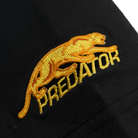 Gold embroidered logo of a leaping animal and the word 'Predator'.
