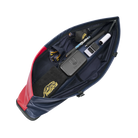 Unzipped top view of a red and blue pool cue case containing PREDATOR branded accessories