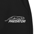 White Predator logo against a black fabric background.