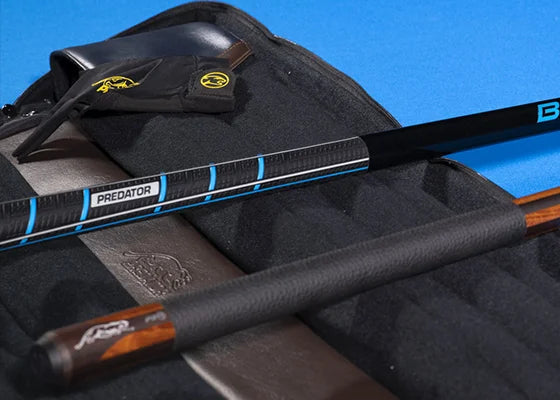 BK Rush and Pool Cue on a Table