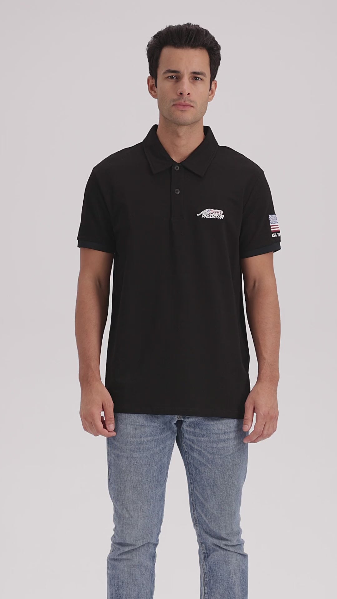 Video of a man wearing black polo predator shirt